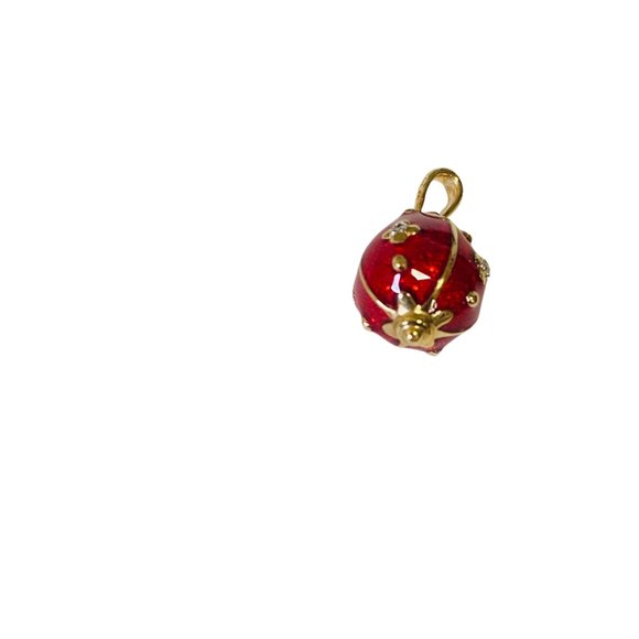 EggshapedRed bakedEnamel with white diamonds charm in solid 14k Gold.